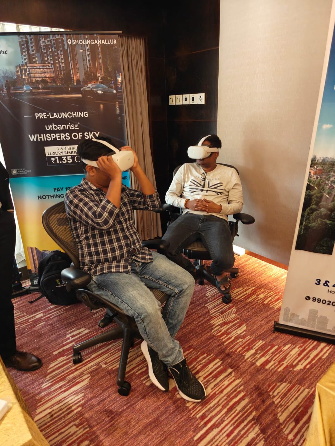 Visitors experiencing an Urbanrise project through VR headsets