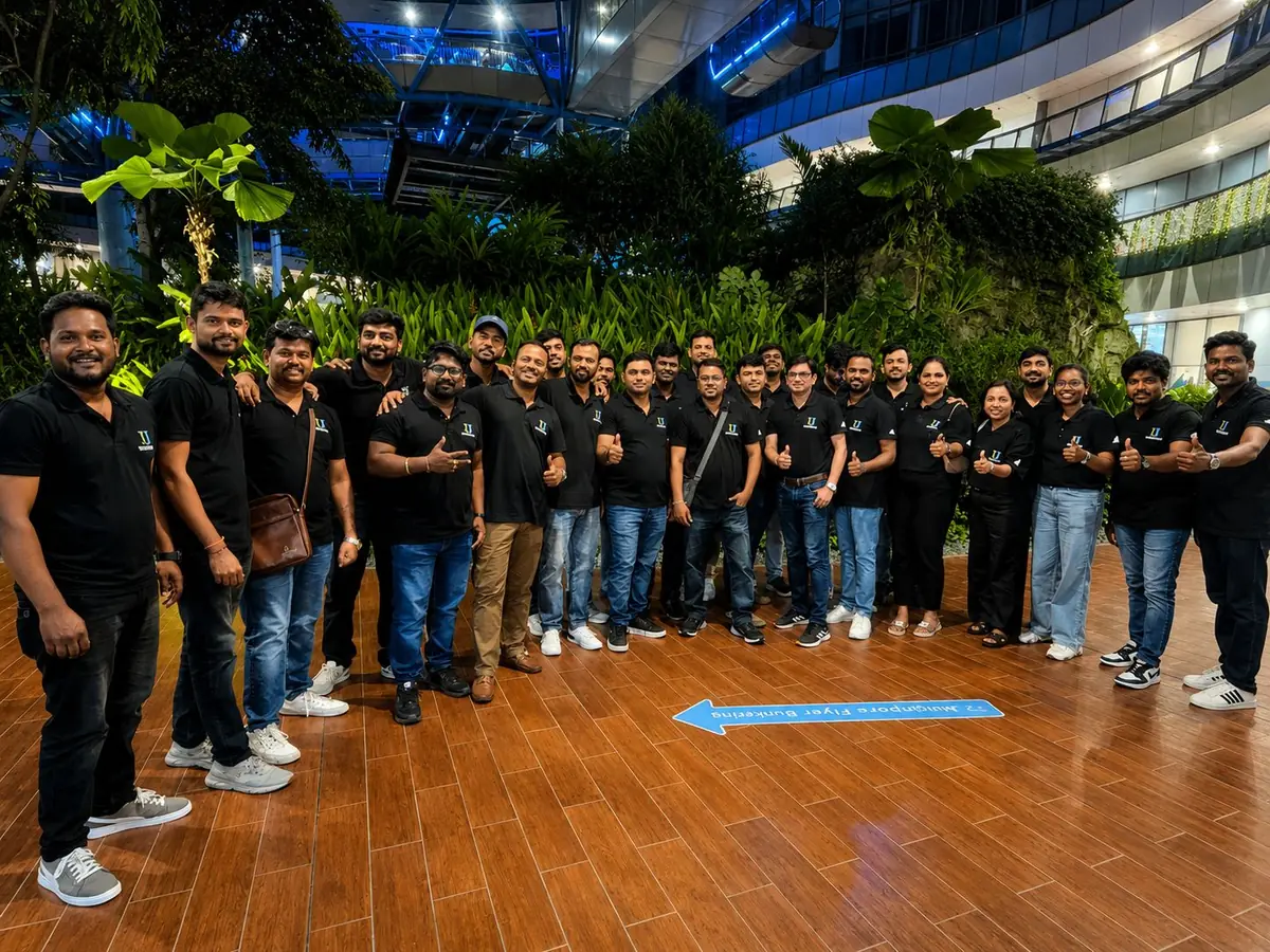 Urbanrise team in branded shirts, smiling, thumbs up